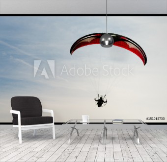 Picture of One Man Rides Flies Ultralight Flying Through Blue Sky